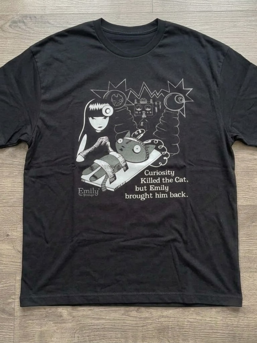 the Strange Black Graphic Cat T-Shirt